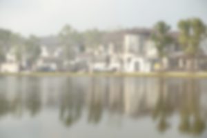 abstract blur exteriors of house with lake view for background
